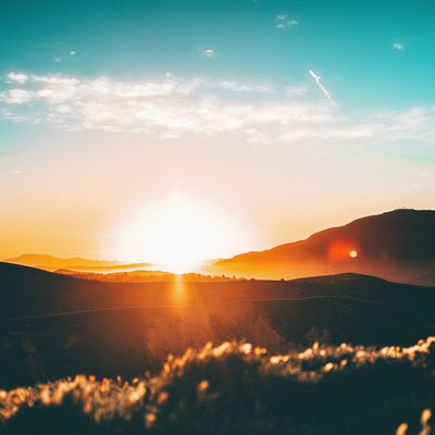 Sunrise over low hills, stylized, painterly, retro feel
