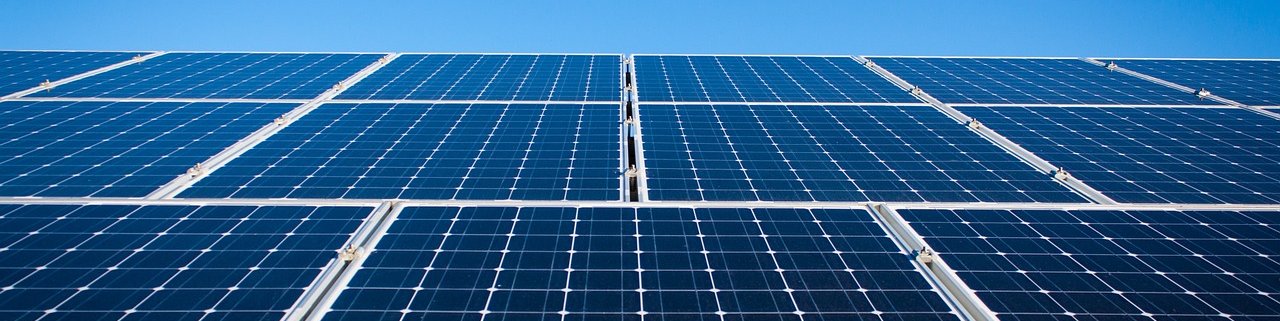 Abstract; array of panels under a blue sky