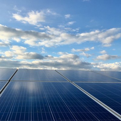 Long view up panels toward a sky with low light