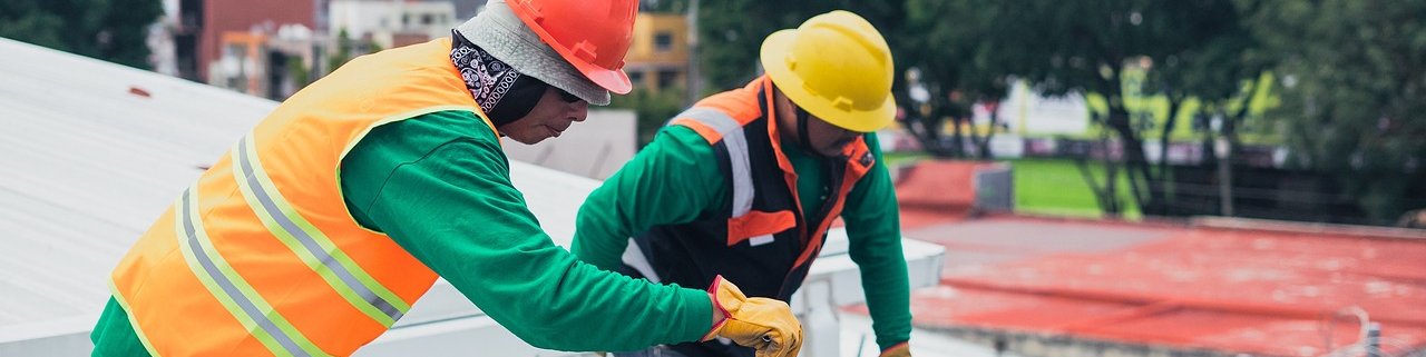 Workers installing solar panels